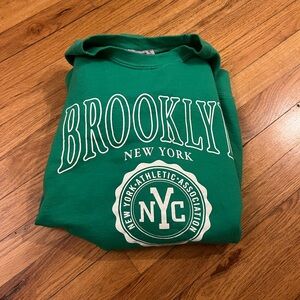 Green crew neck